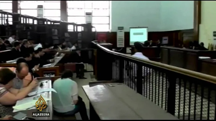 Mohamed Fahmy condemns imprisonment