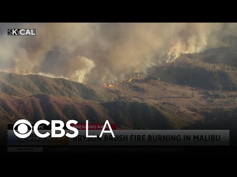 Crews battle Malibu brush fire as Red Flag Warnings are in place