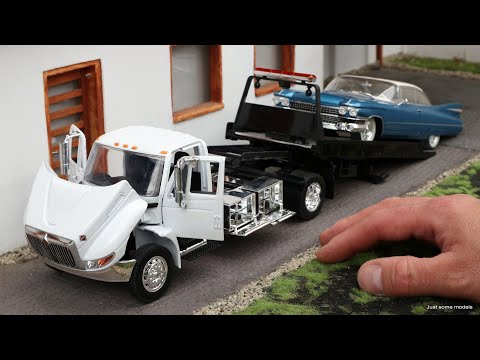 1:24 International DuraStar 4400 flat bad tow truck - Jada
