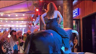 Very Funny Girl Riding On A Mechanical Bull In Benidorm | Bull Riding 4K