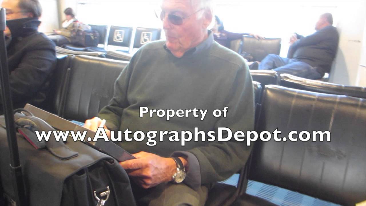 Batman star Adam West signing autographs at the Seattle international airport (March '13)