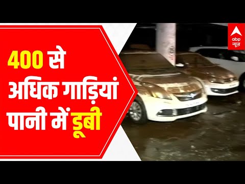 400 vehicles submerge in flooded parking lot of Mumbai