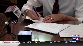 Governor signs Wisconsin budget overnight after swift passage; vetoes deadline to close GBCI