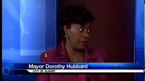 Mayor Dorothy Hubbard talks with Romney about upco...