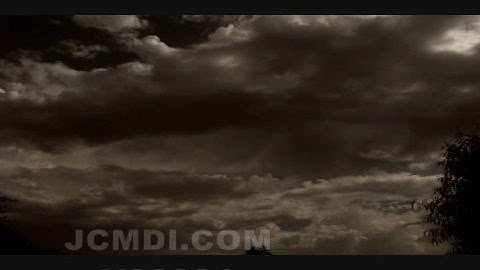 V03031 sepia-ish cumulus drift slowly HD timelapse