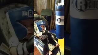 Xavier at 6 mos on his Ringside Heavy bag