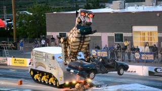 Megasaurus eating through a car