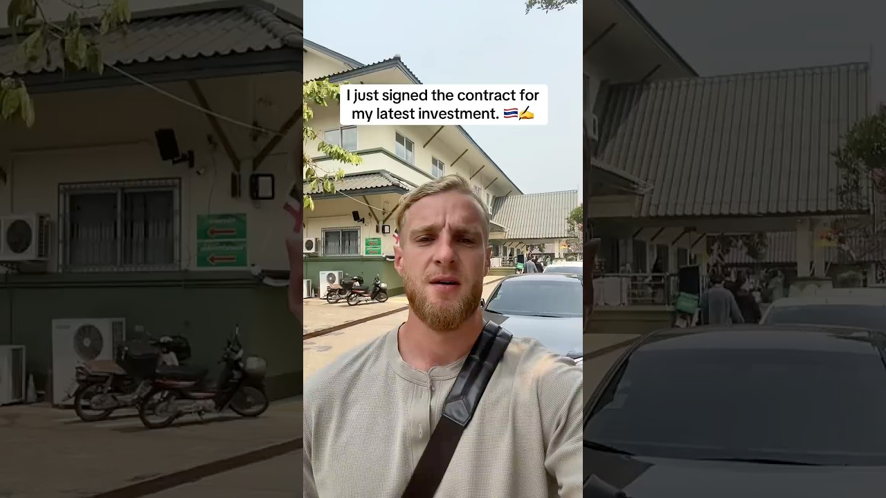 Stan Brinkman walking out of the Land Office with a verified Chiang Mai freehold deed &mdash; Brinkman Data field footage