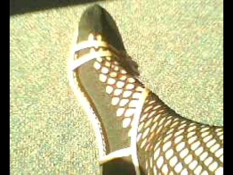 Black fishnet foot play