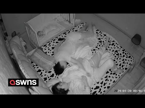 CCTV shows husband punching his wife in the stomach during a nightmare | SWNS