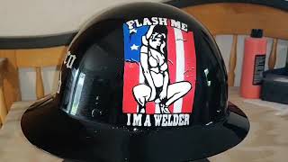 Custom hard hat, skulls roses and strippers