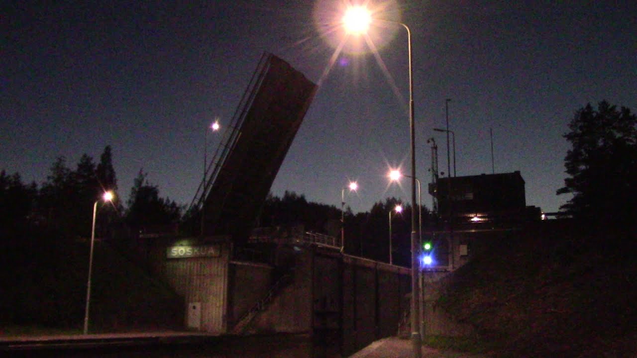 Soskua lock drawbridge opens to yacht @ Saimaa canal, Lappeenranta, Finland