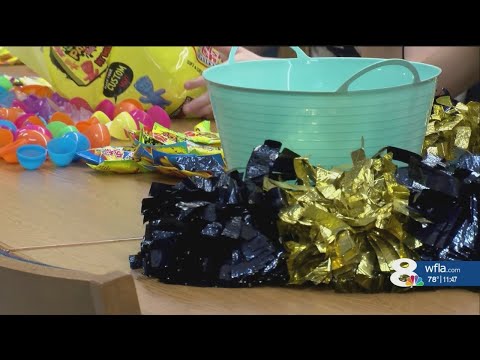 Alonso High School cheerleaders help Easter Bunny deliver eggs for fundraiser