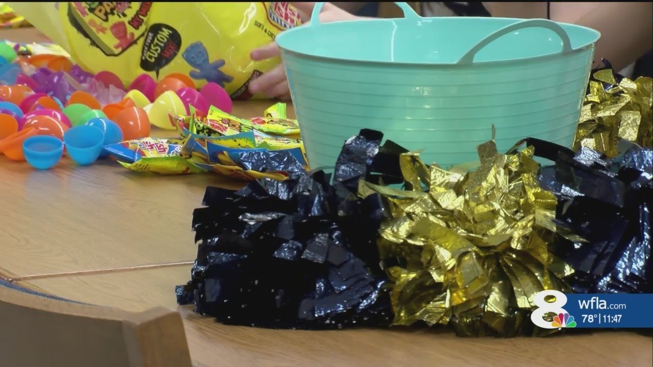 Alonso High School cheerleaders help Easter Bunny deliver eggs for