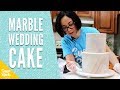 How to cover a cake in marbled fondant