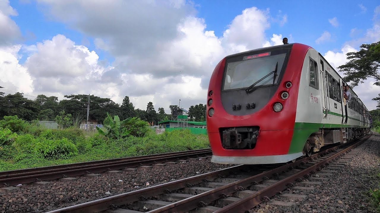 Bangladeshi DEMU (Diesel Electric Multiple Unit) Train Passing Through