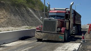 Truckers coming down 10 Mile Hill with heavy load 