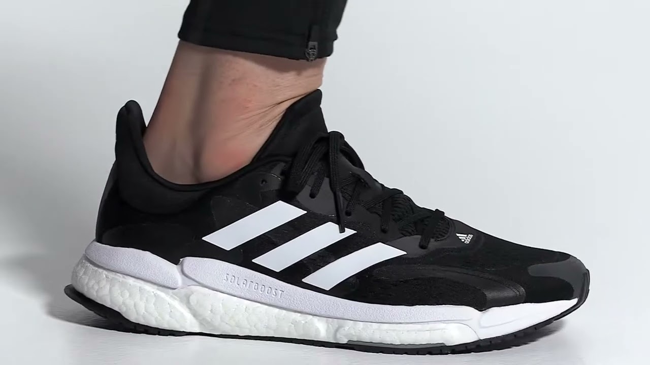 SOLARBOOST 4 SHOESA WORKHORSE RUNNING SHOE MADE IN PART WITH RECYCLED MATERIALS.