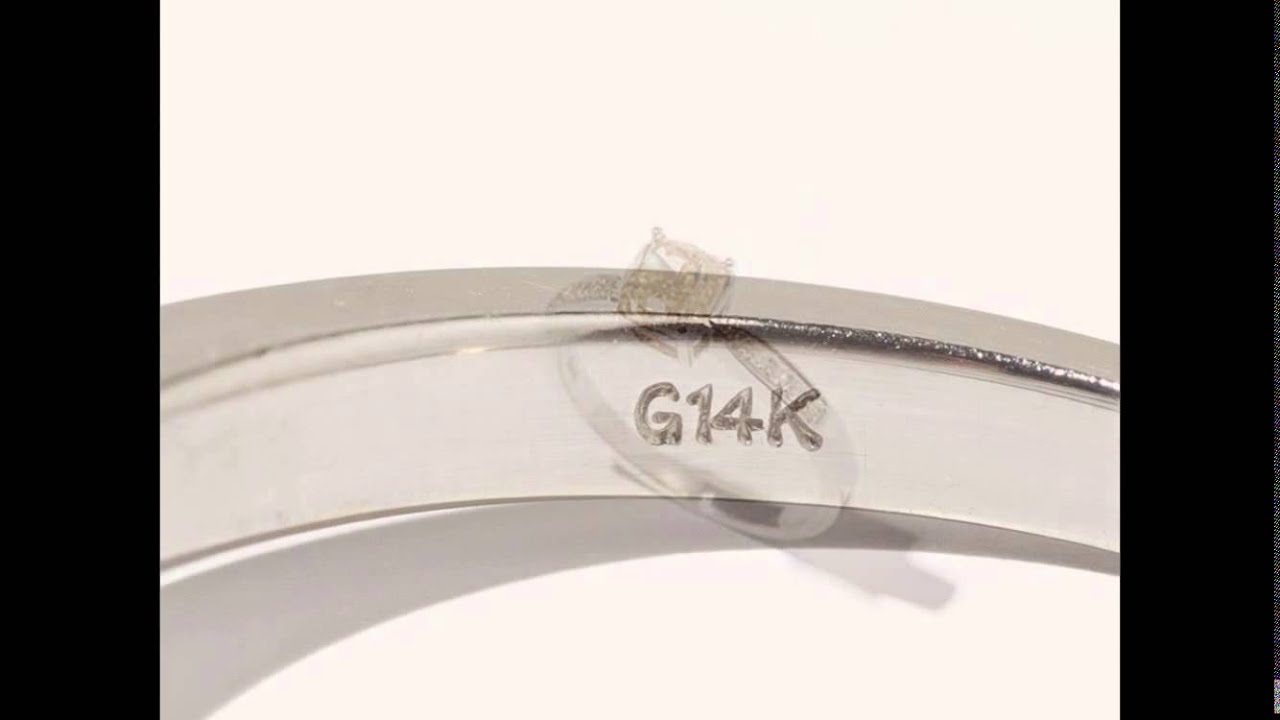 Damenring mit 1 Fancy Champagner Diamant und 10 Brillanten