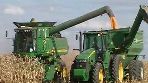 Russell Farms, Harvesting with Deere, unloading on the go. good example of harvest time for us.