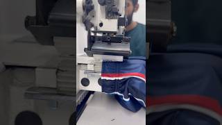 Elastic waistbands getting shaped for premium shorts. #sportswearfactory #sportswear #sewing