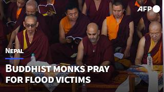 Buddhist monks offer prayers for Nepal flood victims | AFP