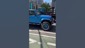 2020 Jeep Gladiator with Custom Grabber Blue with wheels to match making it look like a Gladiator FR
