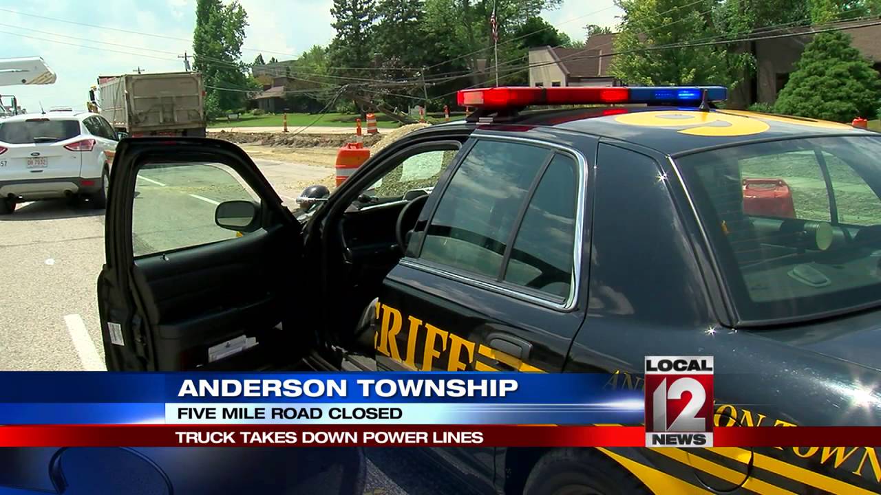 Construction truck takes down utility poles and power lines - YouTube