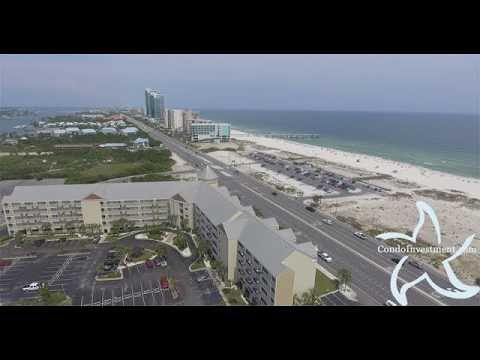 Grand Caribbean Condo Aerial Video Orange Beach - CondoInvestment.com