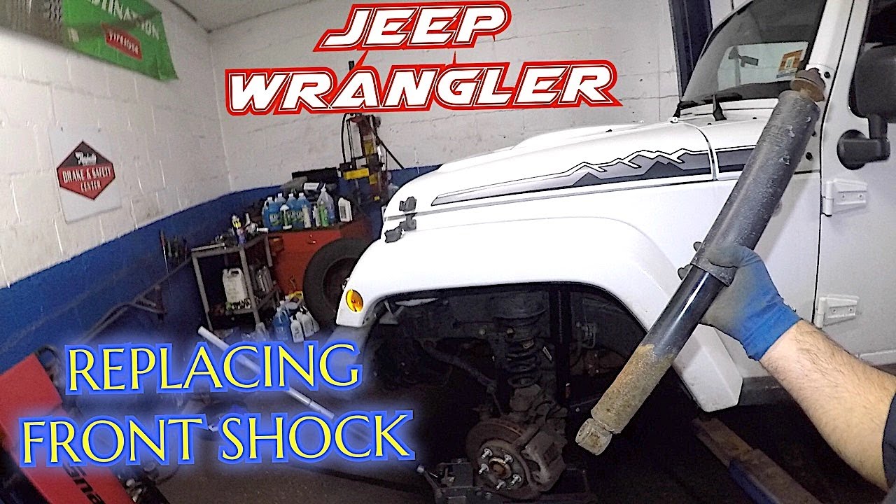 How to replace front shocks on Jeep Wrangler - YouTube
