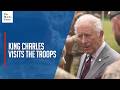 King Charles visits soldiers ahead of 'Trooping the Colour' parade