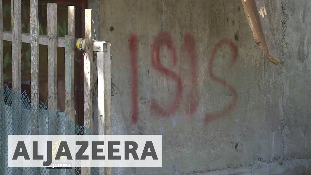 Philippine army retakes town from armed group