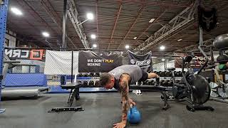 Feet Elevated Kettlebell Plank Drag Across