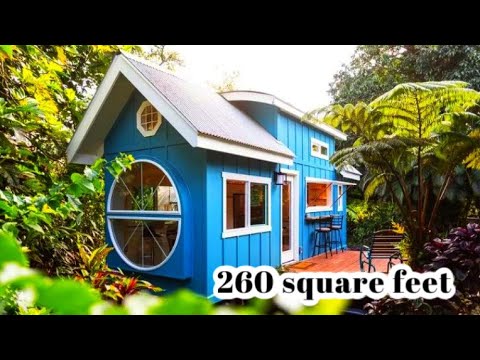 Tiny House With A Big Round Window And Tons Of Character