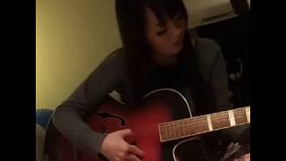 Hitomi Tanaka Playing Guitar