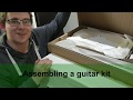 How to make a simple DIY box guitar - YouTube