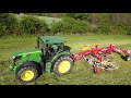 John Deere 6150R mit Pöttinger Top 662 am Schwadern