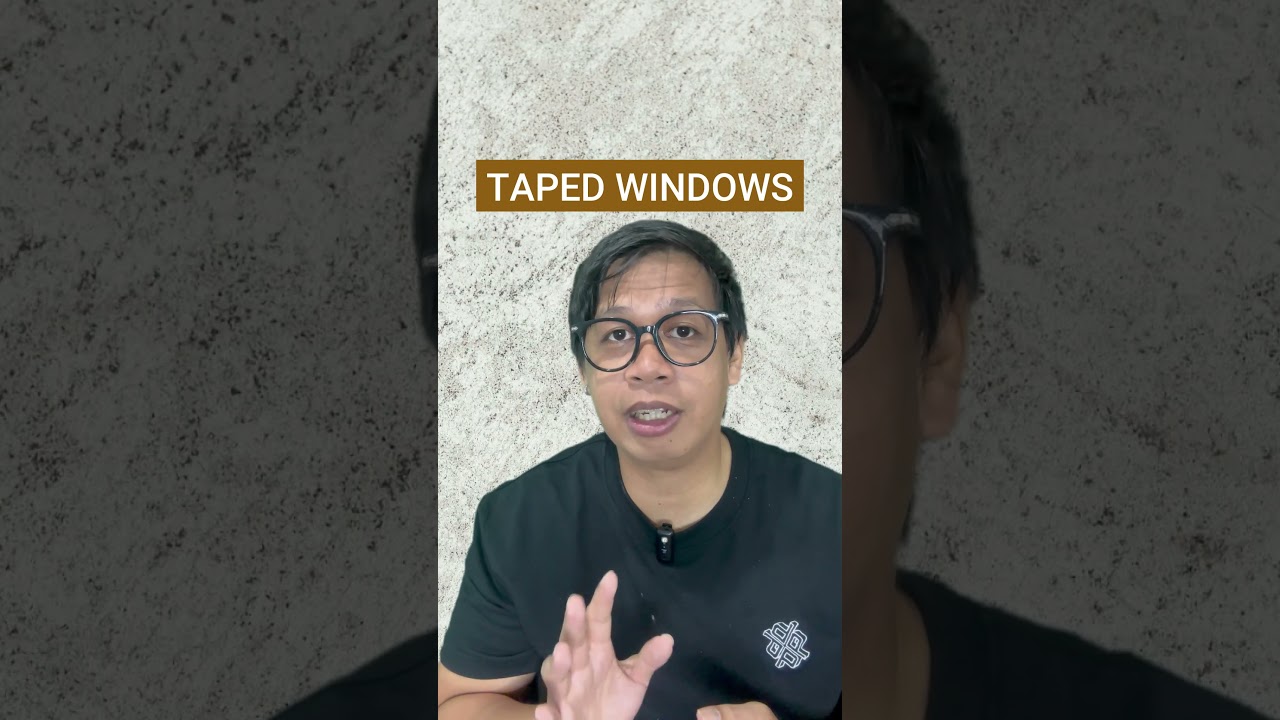 Taped Window Storm Protection /  