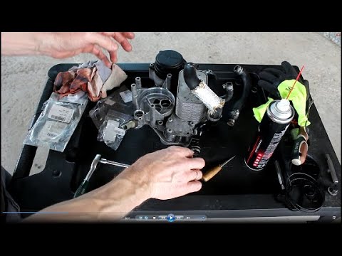 Замена прокладок теплообменника двигателя на АУДИ Q7 2008 AUDI Q7 3,0 дизель 3часть