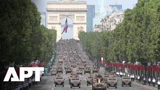 WATCH | Heavy Armor Rolls Across Paris During France's Grand Military Parade | APT