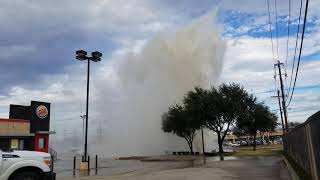 Water Main Break in parking lot of Burger king Irving, Texas