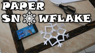 MAKING A PAPER SNOWFLAKE FOR THE FIRST TIME