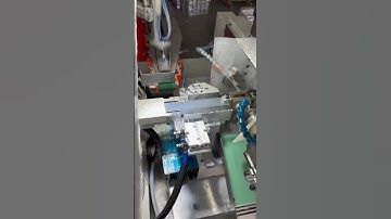 Full-automatic double-head chamfering machine