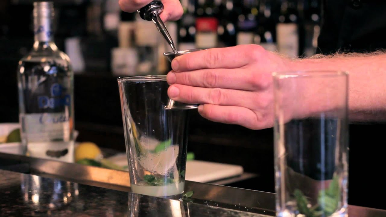 How to use a Peeler for Cocktail Garnishes - DrinkSkool Bar Techniques 