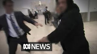Man arrested at Sydney Airport lashes out at police