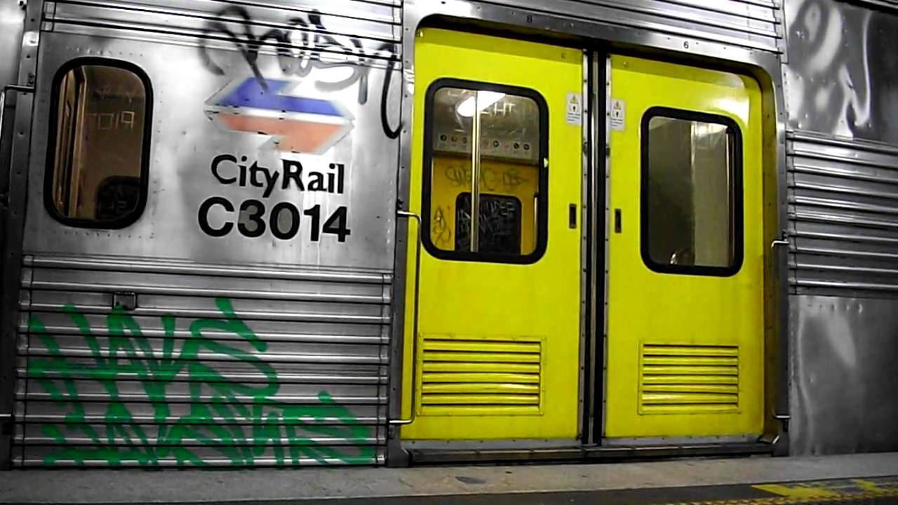 Cityrail R set R25 departs Circular Quay station at night
