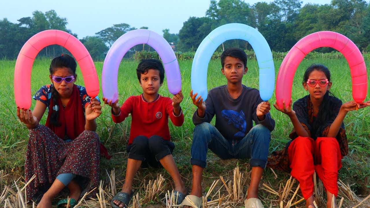 kids fun with rocket balloon pop in outdoor field and learn colors for