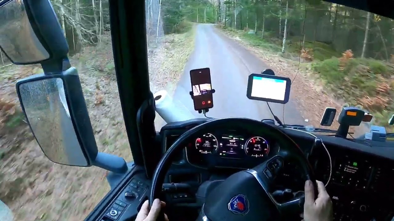 Scania r450 POV driving tru Sweden forest.