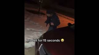 Guy slips on snow for 15 seconds then falls