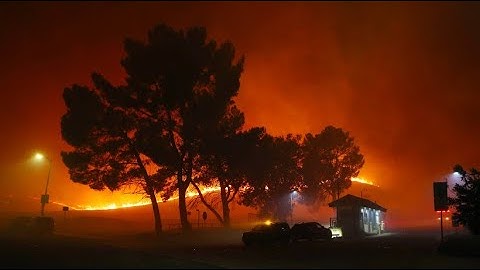 100,000 people fleeing the flames
